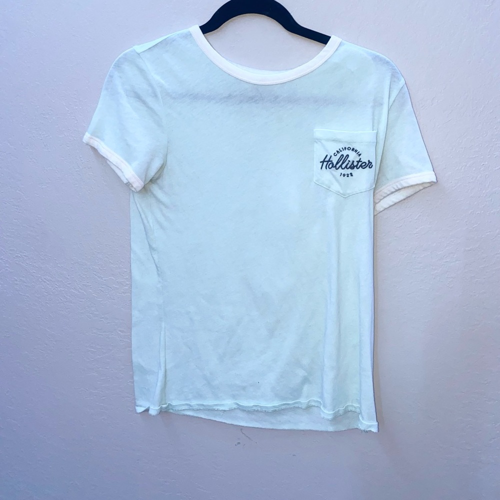 Hollister size medium and color and very pretty light greenish!
